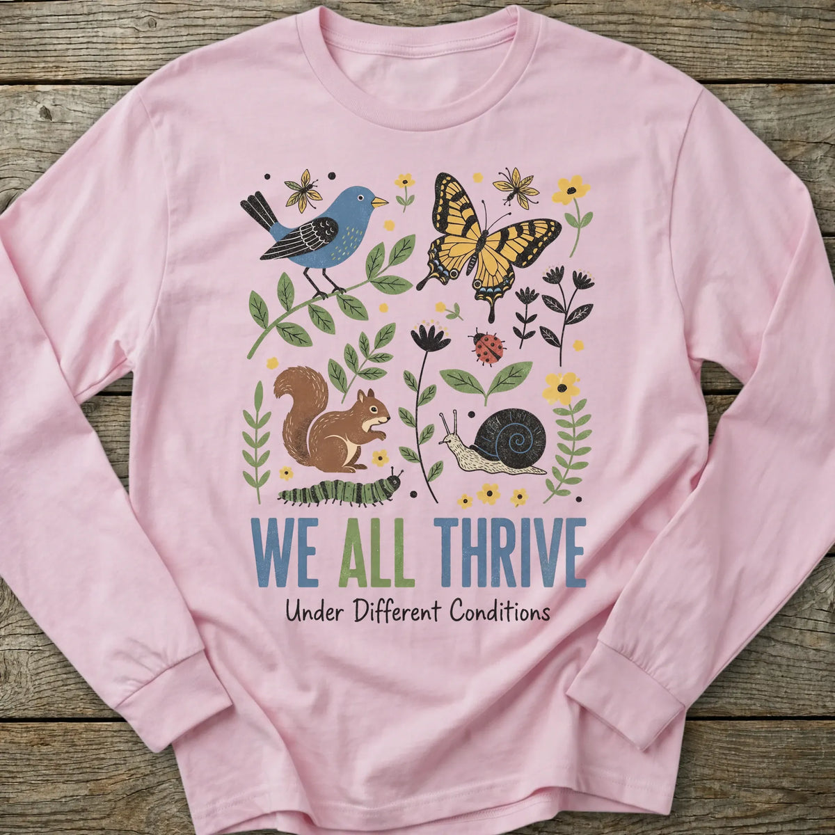 Printify Long-sleeve We All Thrive Long Sleeve T-Shirt